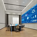 Modern Monitoring Room With Data Screens And Rows Of Workstations