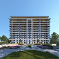 Modern High Rise Residential Building With Green Lawn Purple Flowers And Trees