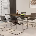 Modern Dining Table Set with Transparent Chairs Metal Legs Green Fruit Bowl and Abstract Painting