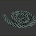 Gray Thick Coiled Rope In Spiral Shape A Practical Decorative Household Item For Daily Use