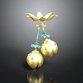Golden Decorative Household Item With Flower Shaped Top And Blue Accented Bells