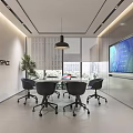 Modern Conference Room With Round Table Black Chairs Large Screen And ORIENSYSTEM Logo