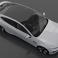White Modern Electric Car With Sleek Aerodynamic Body And Green License Plate