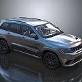 Silver Jeep SUV With Sporty Design Black Wheels Red Brake Calipers And Roof Rack
