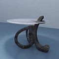 Modern Coffee Table With Round White Tabletop And Unique Black Curved Legs