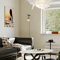 Warm Bright Modern Living Room With Black Leather Sofa Stylish Wall Art And Natural Light