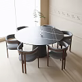 Modern Dining Table and Chairs Set Round Black Tabletop Six Gray Chairs Wooden Armrests Legs