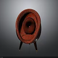Red Patterned Oval Shaped Chair With Wooden Legs And Golden Accents