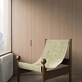 Light Green Checkered Leisure Chair With Wooden Frame By Window And Wooden Wall