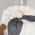 Lazy Sofa White Petal Shaped With Beige Ball Dark Gray Blanket And Brown Side Table