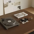 Vintage Turntable on Wooden Table with Books and Small Box
