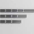 Three Sleek Long Modern Kitchen Appliances With Circular Control Knobs