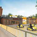 Fun Kids Go Kart Track With Checkerboard Fence And Tire Barriers On Grass Lawn