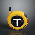 Yellow Circular Electronic Device With Antenna On Top And Black Circle White T