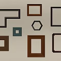 Decorative Photo Frames with Various Shapes and Colors on Beige Wall