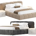 Double Bed in Background with Beige Gray Upholstered Headboard White Sheets Pillows Throw Blanket and Nightstand