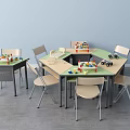 Children's Desks With Green And Beige Surfaces Building Blocks And Toy Cars