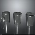 Silver Striped Stainless Steel Trash Cans with Open Lid for Household Supplies on Reflective Surface