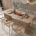 Modern Wooden Dining Table And Chairs Set With Green Plant Oranges And Plates