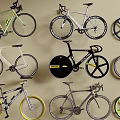 Various Types of Bicycles Including Road and Mountain Styles with Displayed Wheels