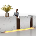 Elegant Marble Reception Desk with Wooden Accents Yellow Lighting Vase Plant and Person Sitting