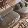 Spacious Curved Multi person Sofa With Gray Green Cushions On Wooden Floor And Round Coffee Table