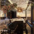 Elegant Modern Restaurant Interior With Floral Ceiling Decor Chandelier Dining Table Chairs And Ambient Lighting