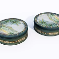 Decorative Ornament Set Featuring Two Circular Green Boxes With Palm Tree Patterns