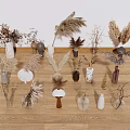 Vases In Various Shapes Materials With Dried Flowers Reeds Feathers On Wooden Floor White Wall