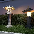 Traditional Japanese Stone Lanterns As Garden Ornaments With Green Shrubs Grass And Stone Pathway