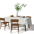 Wooden Dining Table And Chairs Set With White Lace Tablecloth Green Plant Fruits And Books