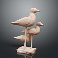 Two Wooden Bird Figurines Stacked on Intricate Carved Wooden Base Design