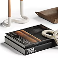 Decorative Ornament Set With White Candle Holders Brown Tray Black Books And Knotted Decor