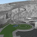 Silver Slide Amusement Equipment With Grey Rock Wall Green Grass And White Platform