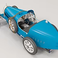 Blue Vintage Electric Toy Car With Detailed Wheels And Classic Cockpit Design