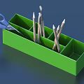 Pencils and Brushes in Green Pencil Case with Blue Scissors on Side