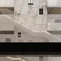 Modern Architectural Interior Design With Wooden Grilles Staircase Textured Wall And Windows