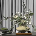 Rustic Ceramic Vase With Blooming White Cream Flowers Greenery On Book Stack Near White Curtains