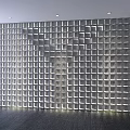 Modern Chandelier Illuminating Room With Translucent Square Wall Gray Brick Sides And Dark Floor