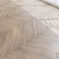 Light Wood Herringbone Pattern Flooring With Natural Texture In Bright Room 3d model