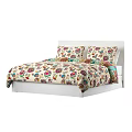 Double Bed With White Frame And Colorful Floral Bedspread And Pillows