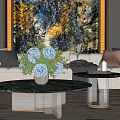 Plush White Sofa and Marble Top Coffee Table Set with Colorful Pillows and Abstract Artwork