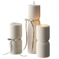 Tall And Short Decorative White Ribbed Candles With Lit Flame And Text Ribbons