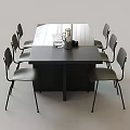 Modern Black Dining Table With Six Sleek Chairs And Minimalist Design
