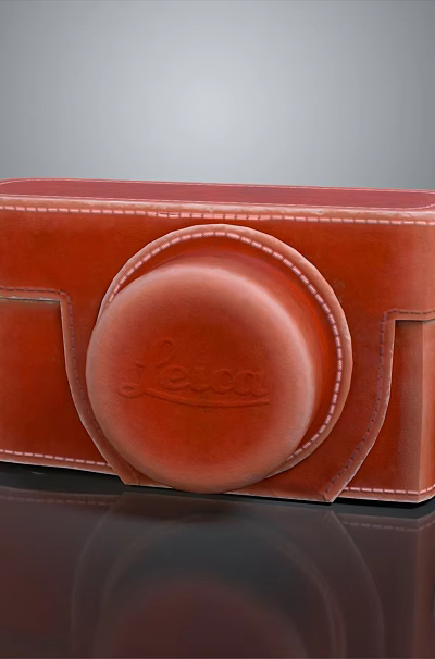 Red Leather Laptop Bag with Circular Design and Comfortable Shoulder Strap 3d model