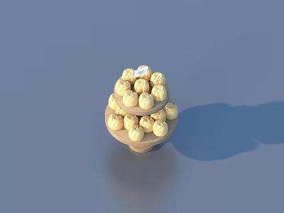 Two Tiered Pastry Stand With Yellow Pastries And White Decoration On Top 3d model