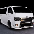 White Toyota Van With Modern Exterior Design Black Alloy Wheels And Tinted Windows