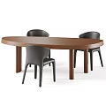 Oval Walnut Wood Dining Table Set With Modern Black Chairs And Sturdy Legs