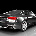 Black Audi RS5 Sportback With Sleek Body And Modern Alloy Wheels Design