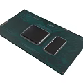 Intel Core Processor Chip With Dual Black Core Modules On Green Circuit Board